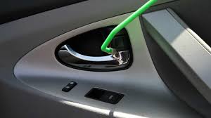 Professional Locksmith Using Long Reach Tools